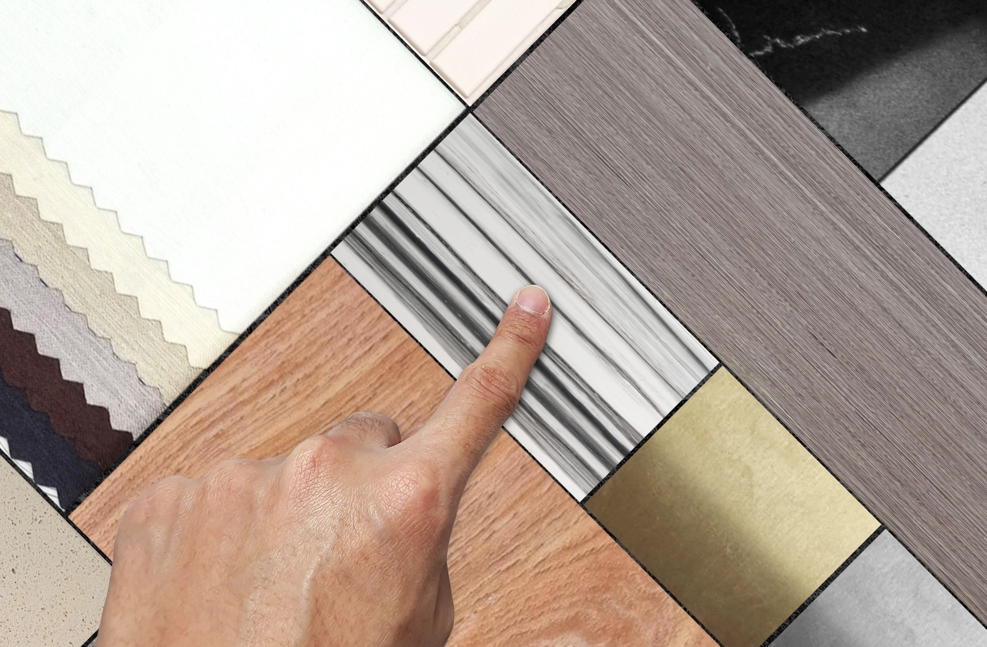 interior designer's hand choosing material palette samples featuring a diverse range of textures: elegant wood, luxurious marble, versatile tiles, stainless and soft fabrics.